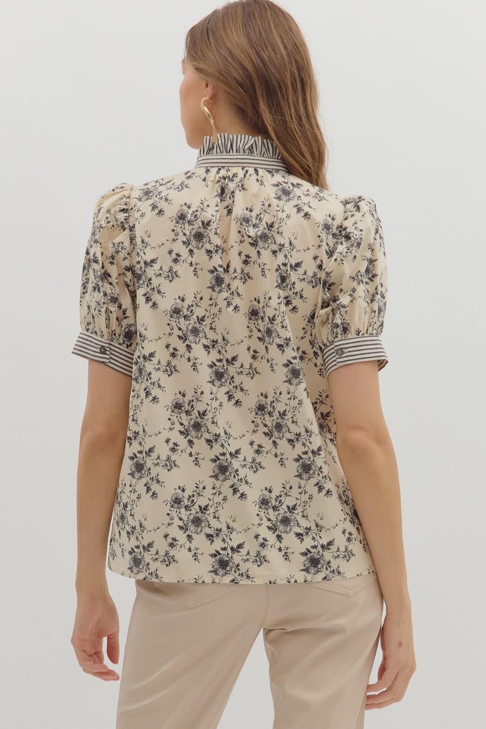 Ecru floral print cotton short sleeve top with puff shoulders and striped ruffle neck.