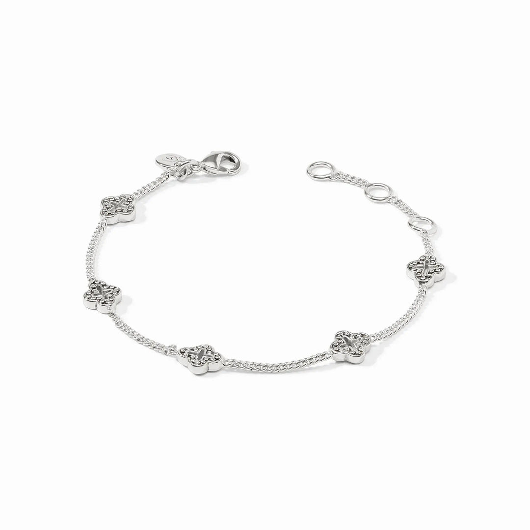 Silver Florentine delicate bracelet with petite quatrefoil stations on a slender adjustable chain.