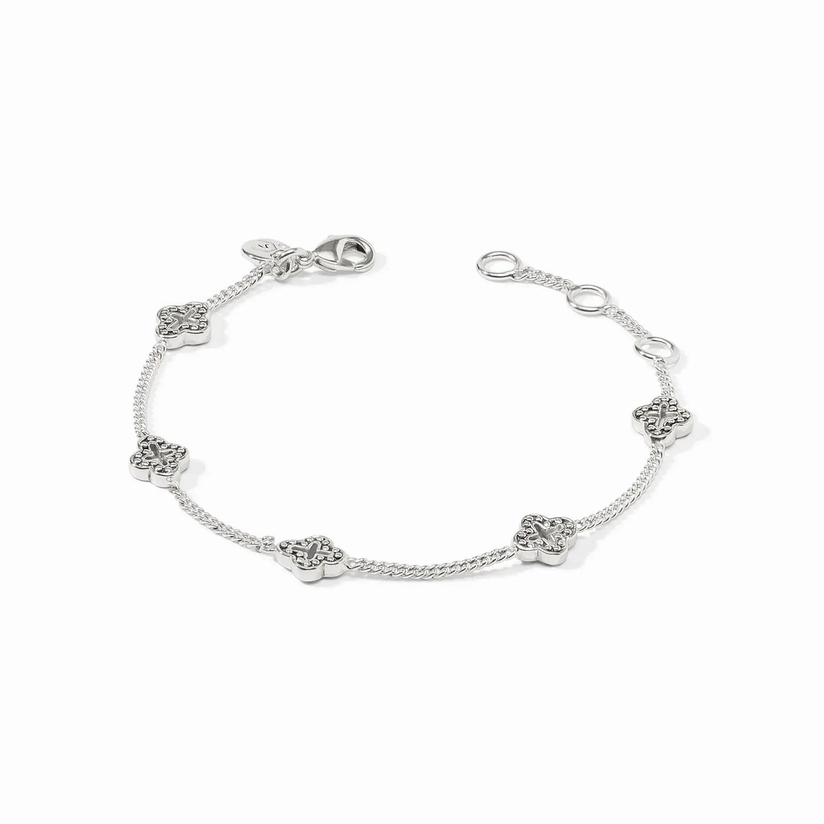 Silver Florentine delicate bracelet with petite quatrefoil stations on a slender adjustable chain.
