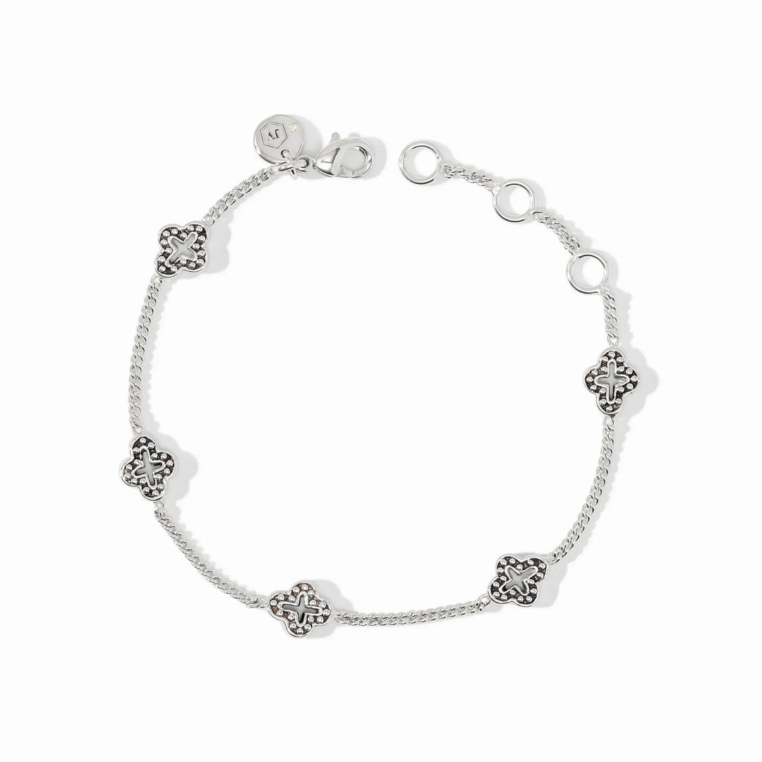 Silver Florentine delicate bracelet with petite quatrefoil stations on a slender adjustable chain.