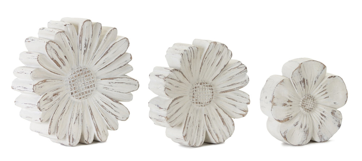 White-washed tabletop flower made from polyresin and stone powder with a natural finish.