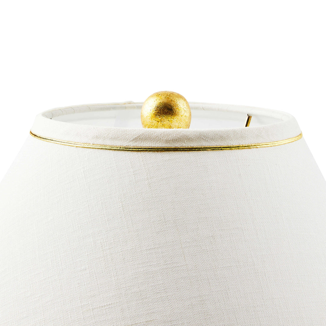 Flutter table lamp with brass leaf butterfly stack on check-patterned hardback shade