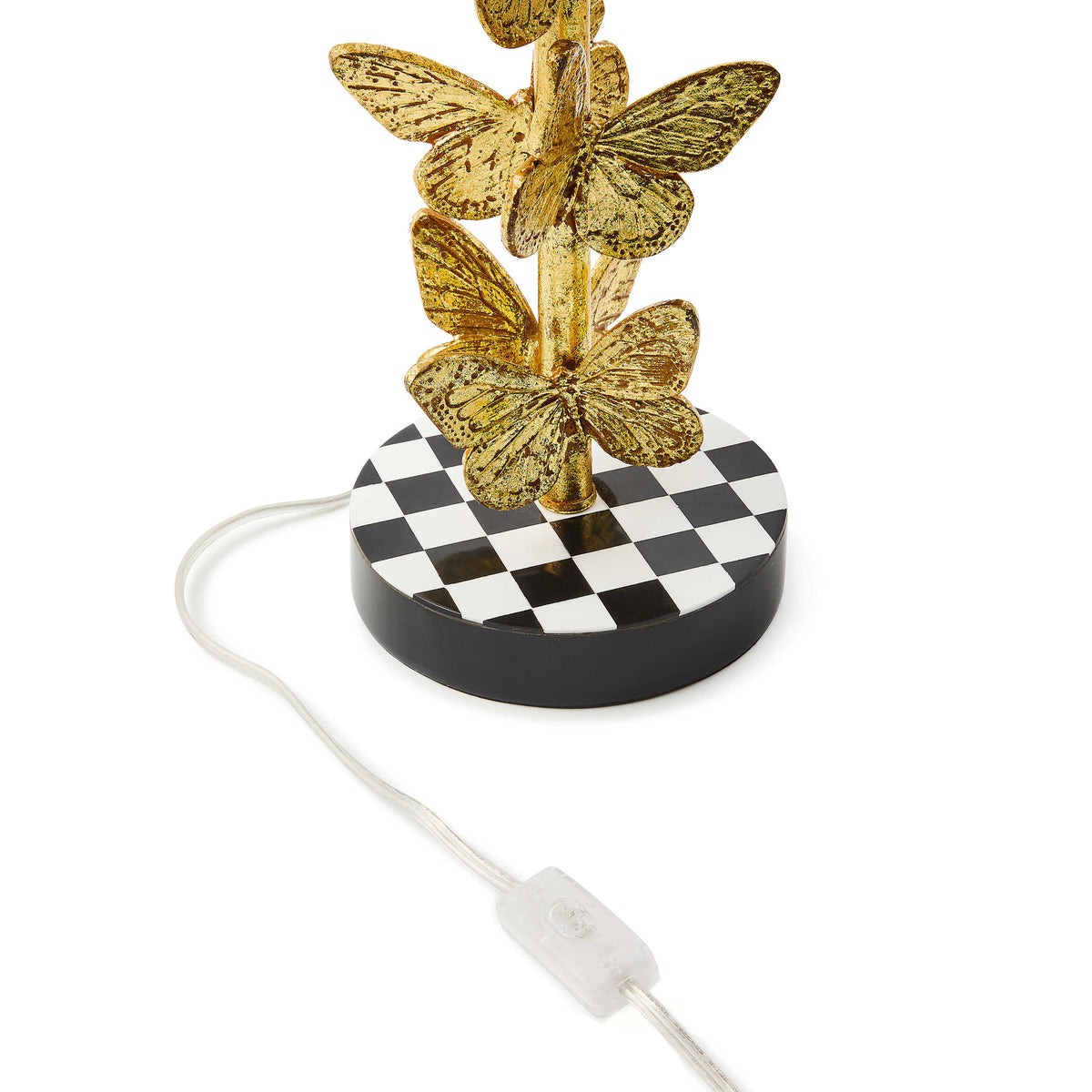 Flutter table lamp with brass leaf butterfly stack on checkered hardback shade
