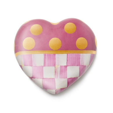Ceramic pink heart-shaped planter with a dotty polka dot pattern.