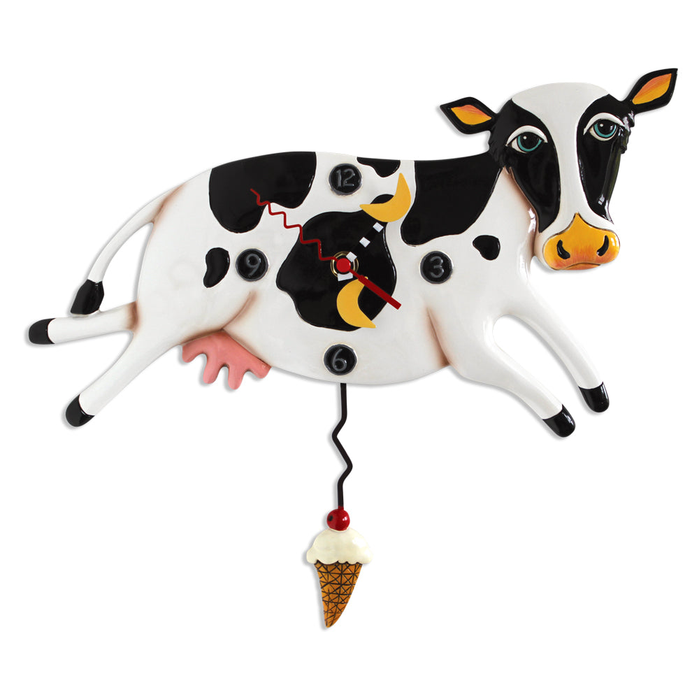 Bessy Cow clock made of polyresin with a black cow silhouette on a white face.