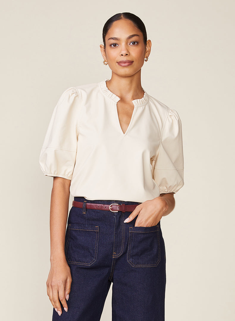 Kacey vegan leather blouse in black with a relaxed fit.