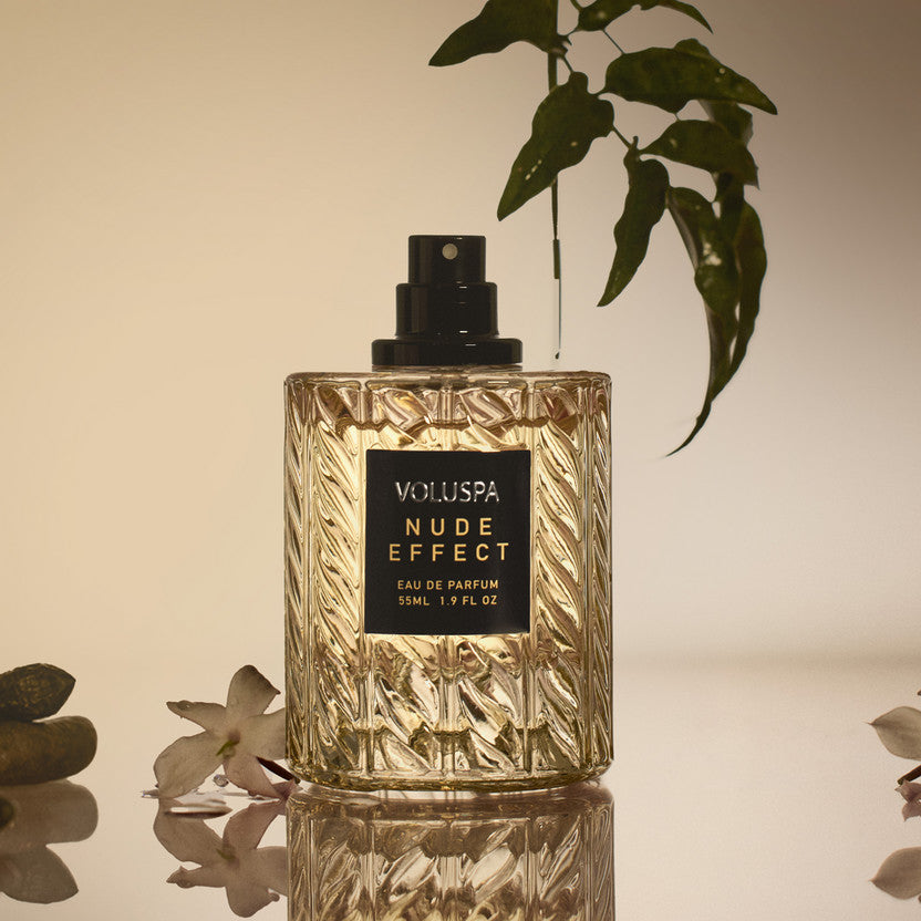 Voluspa Nude Effect 55ml Eau De Parfum in a textured glass bottle with a black label and cap.