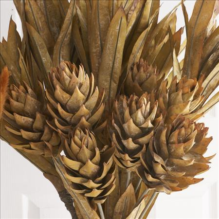 Close-up of a 28-inch light yellow ginger triple flower stem with textured, layered petals.