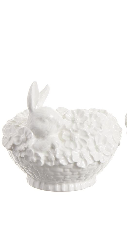Ceramic bunny taper holder with a round silhouette made from dolomite material.