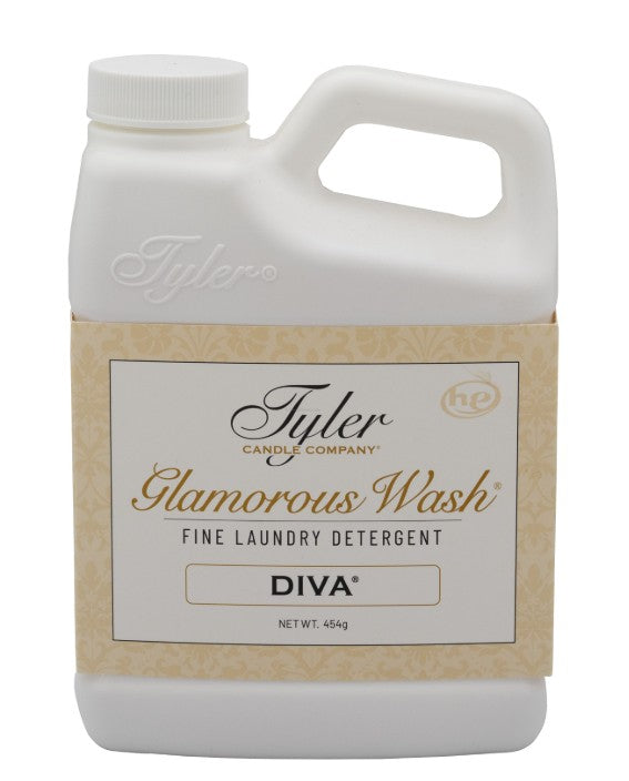 Bottle of Glamorous Wash laundry detergent in a clear container with blue liquid.