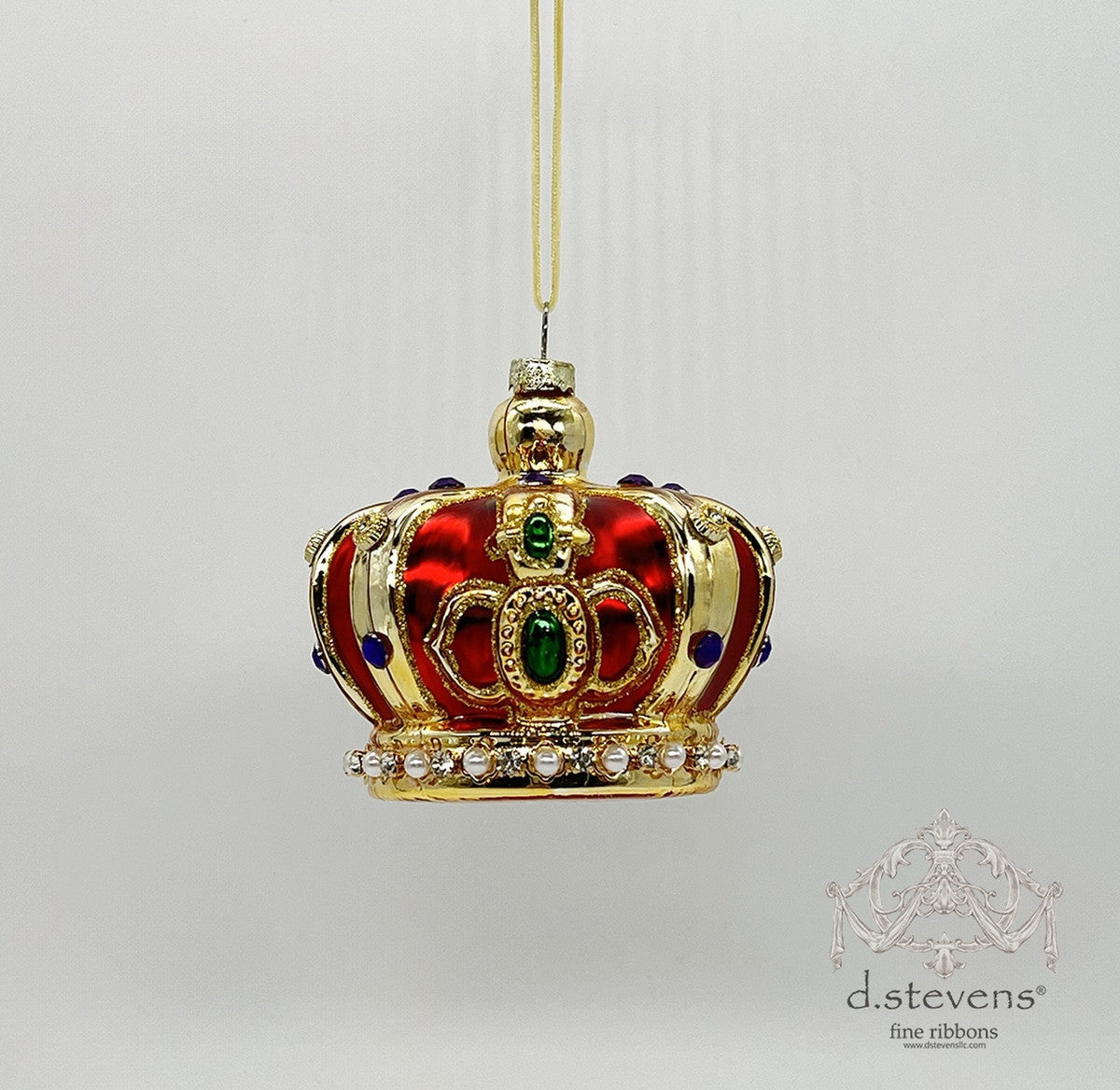 3.875-inch glass regal crown ornament in red and gold with green gems and pearl accents.