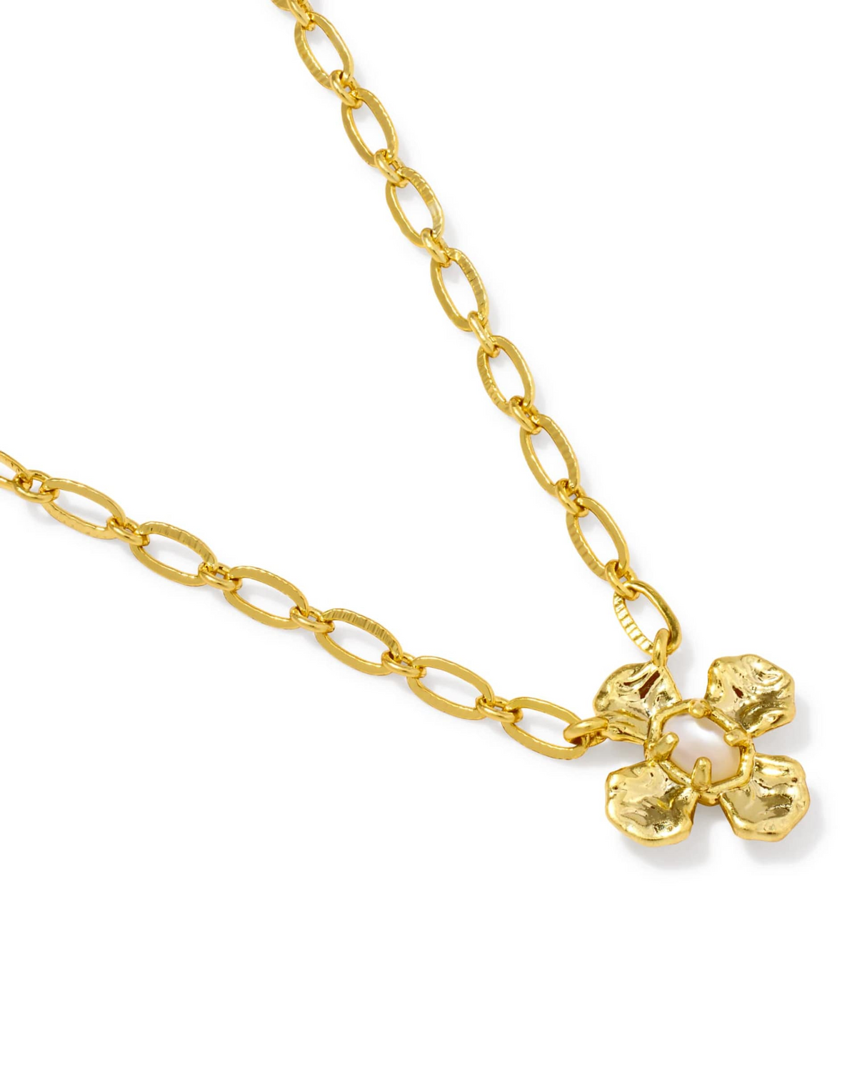Leanne Short Pendant Gold Necklace with a textured floral pendant and oval link chain.