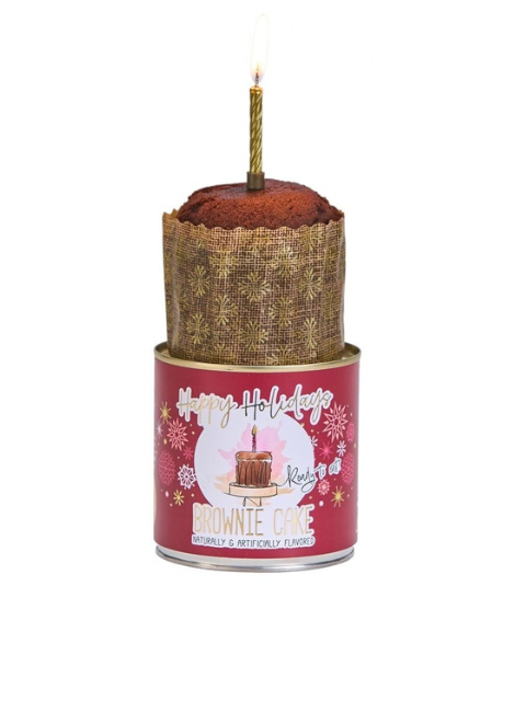 Cancake brownie cake in a red holiday tin with a lit gold candle on top.