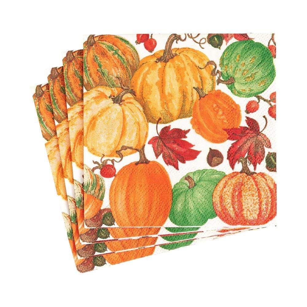 Packaged cocktail napkins with printed designs on triple-ply material.