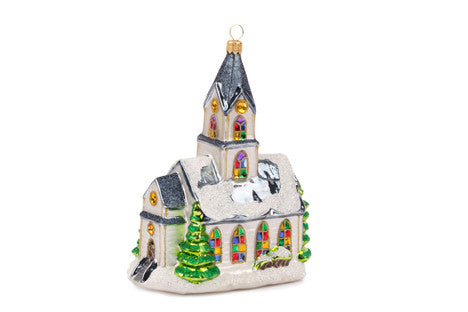 Hand-blown glass chapel ornament with stained glass windows and snow-covered roof.