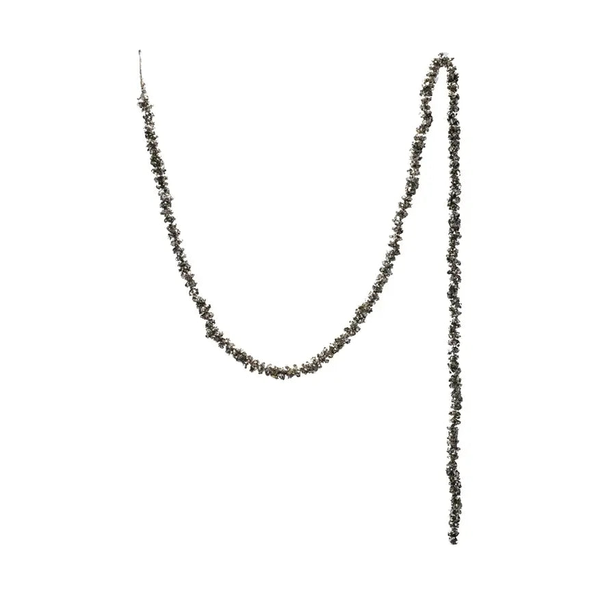 Champagne glitter foam garland with a soft curved silhouette.