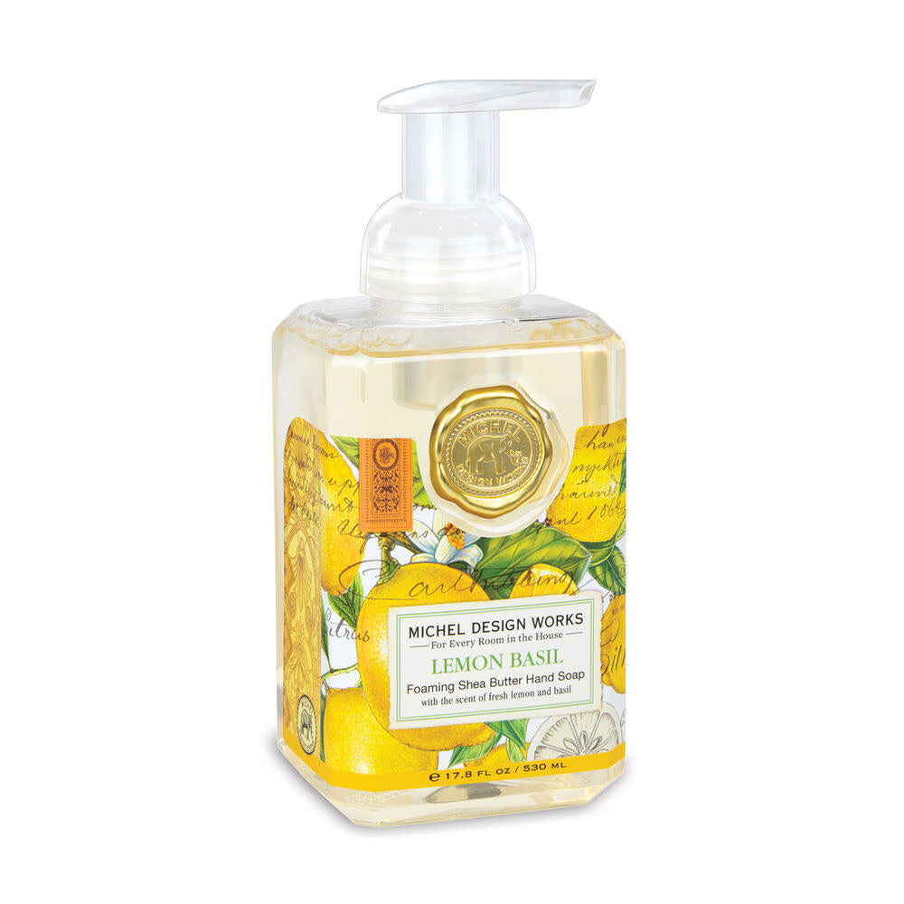 Foaming hand soap dispenser in lemon basil scent with a clear bottle showing pale yellow liquid.