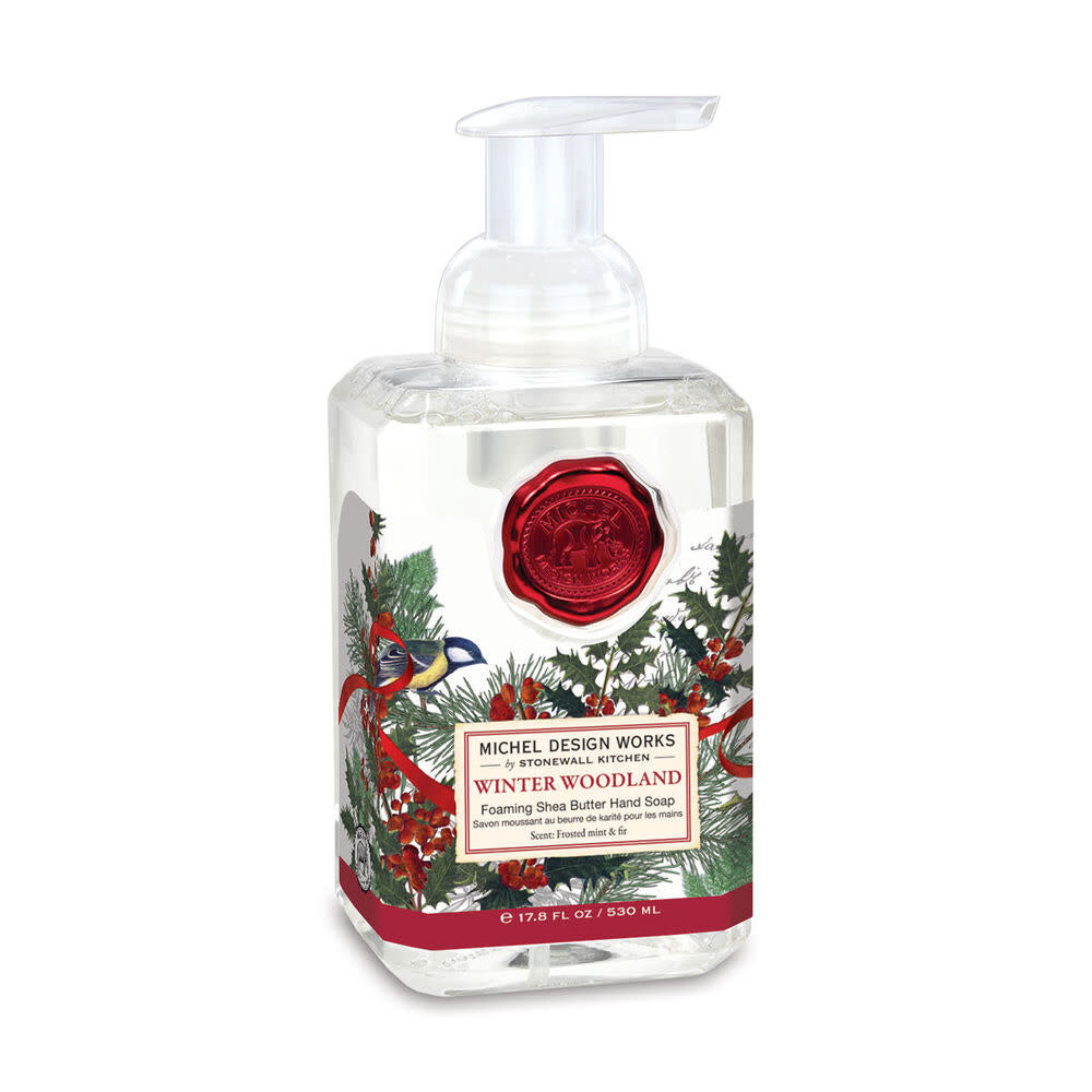 Foaming hand soap dispenser in winter woodland theme with natural wood finish.