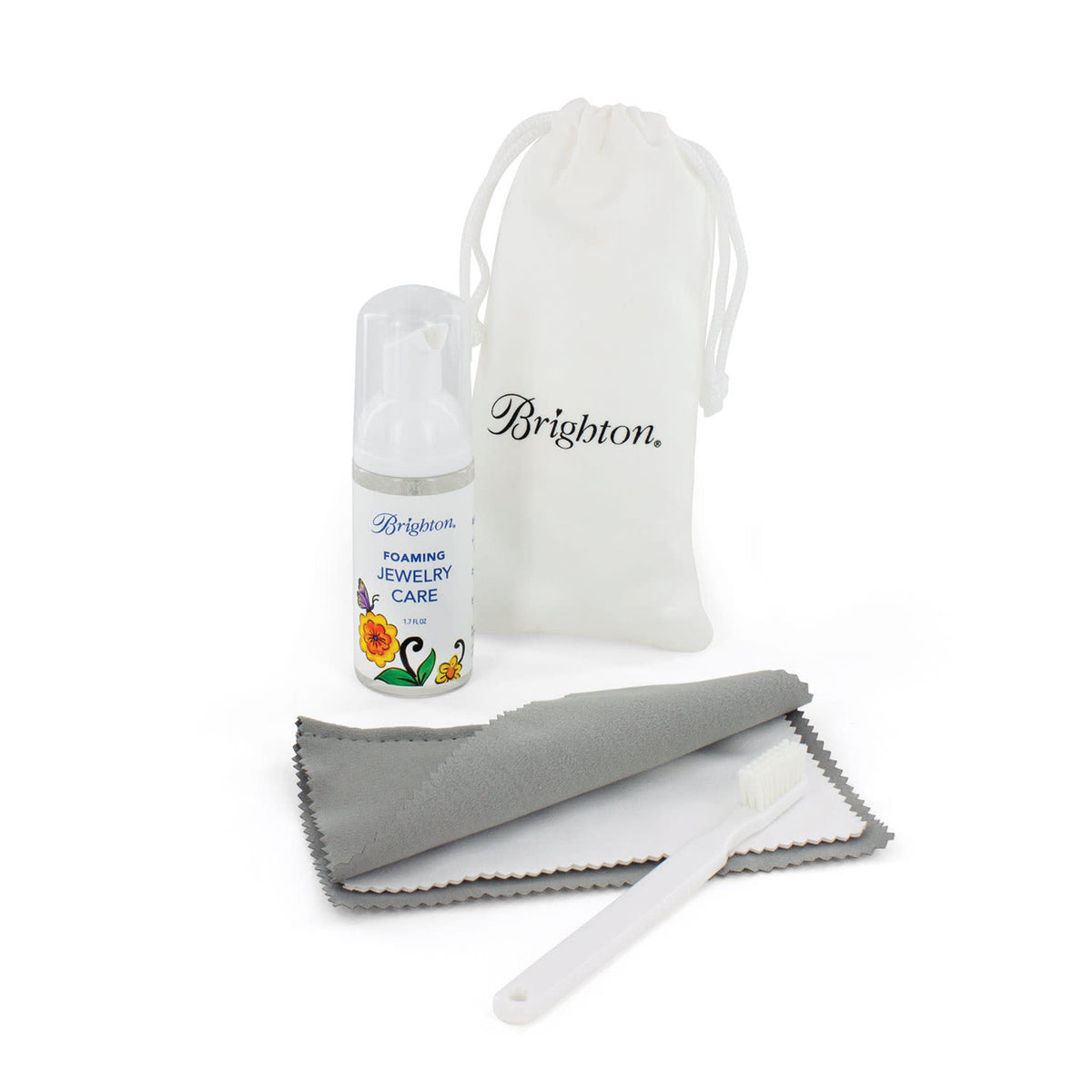 Foaming jewelry cleaning kit with polishing cloth, brush, pouch in a biodegradable bottle.