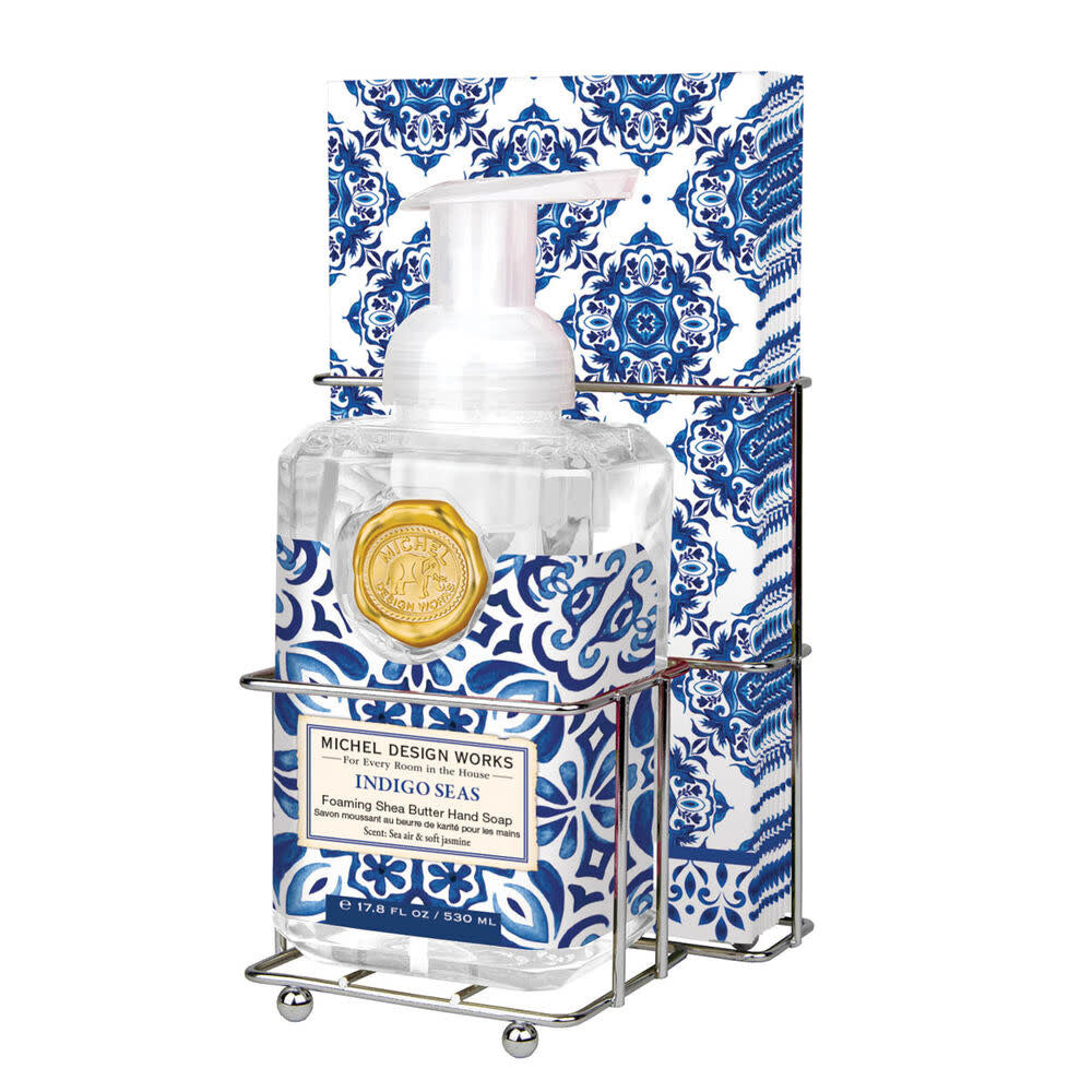 Foaming soap dispenser with matching napkin holder set in neutral tones