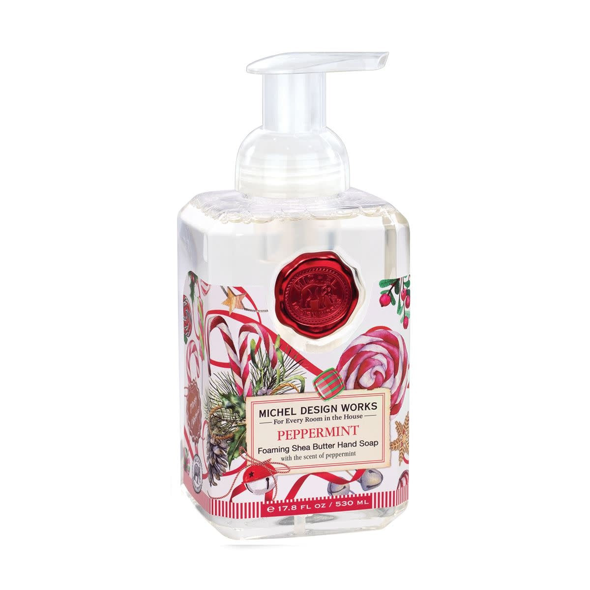 Foaming hand soap dispenser in a clear bottle with green peppermint liquid inside.
