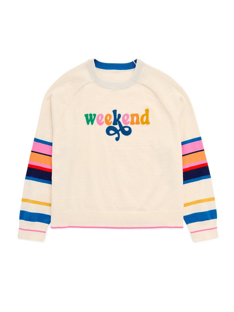 Cream boxy sweater with rainbow striped sleeves and colorful boucle 'weekend' text on the chest.