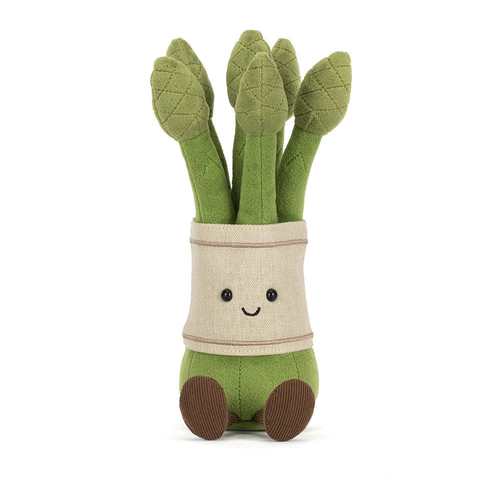 Amuseables Asparagus plush toy with a smiling face, beige band, and brown corduroy feet.