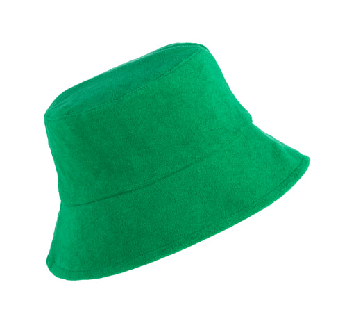Terry cotton vegan bucket hat in a neutral tone with a relaxed sun-protective silhouette.