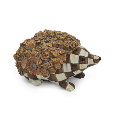 Chocolate checkered hedgehog plush toy with soft fabric texture.