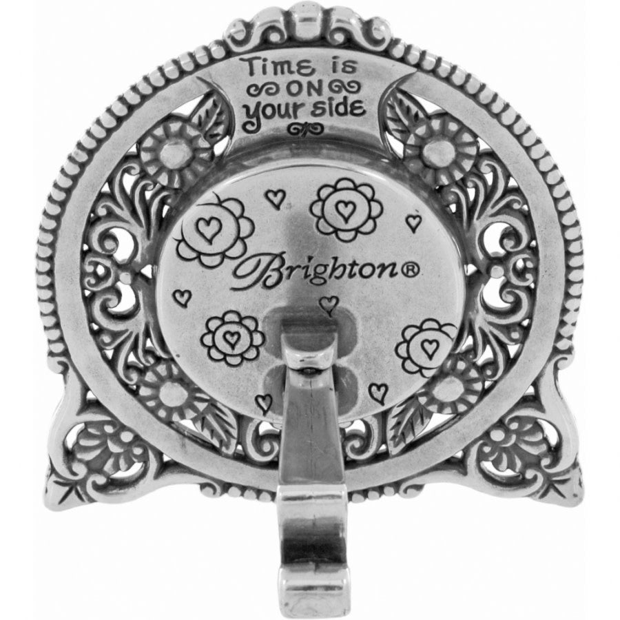 Silver plated swivel arm clock with crystal face showing scrolled floral accents.