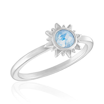 White Opal Sun Stack Ring featuring a round light blue stone in a silver sunburst setting.