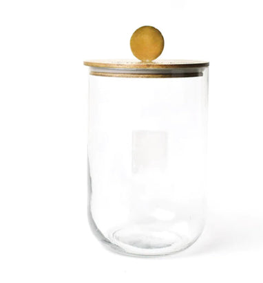 Happy Everything! clear glass jar with a wooden lid and a gold spherical knob.