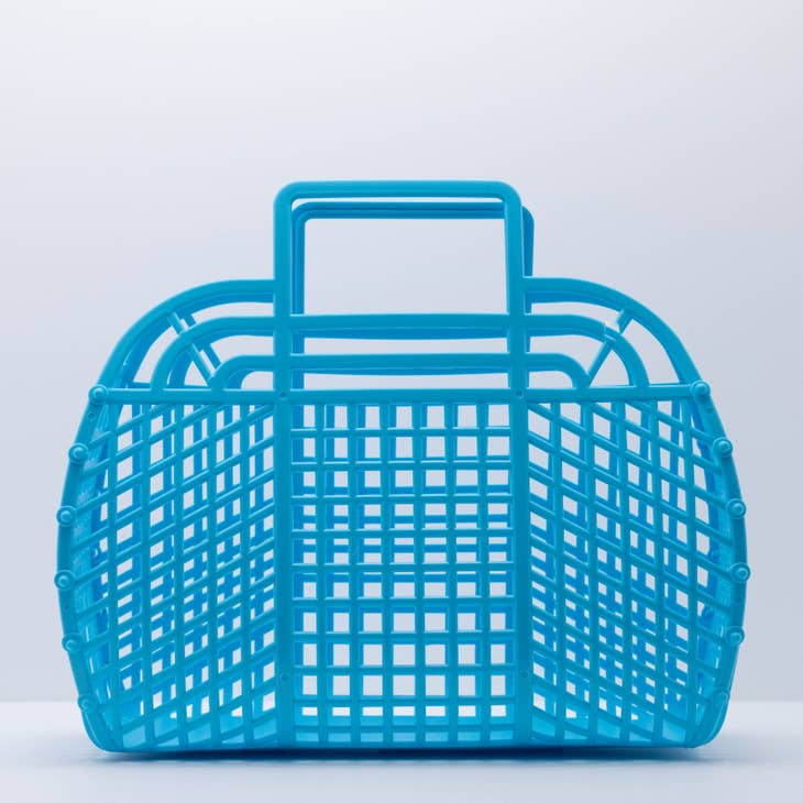 Large retro jelly basket in translucent teal with snap-bead construction.