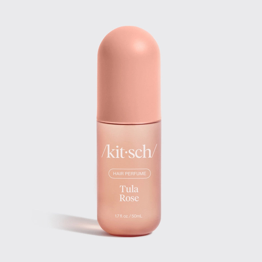 Tula Rose Hair Perfume bottle with soft floral label featuring fresh rose and vanilla scent.