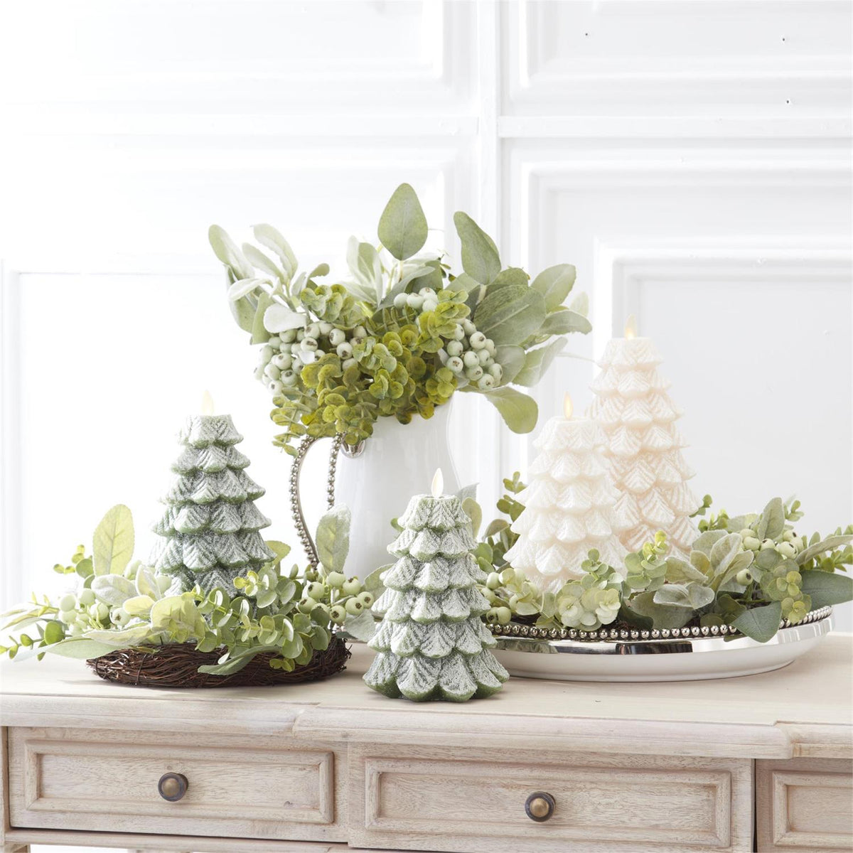 8.5-inch Snowy Tree Luminara indoor candle with realistic flickering flame effect and wintry design.