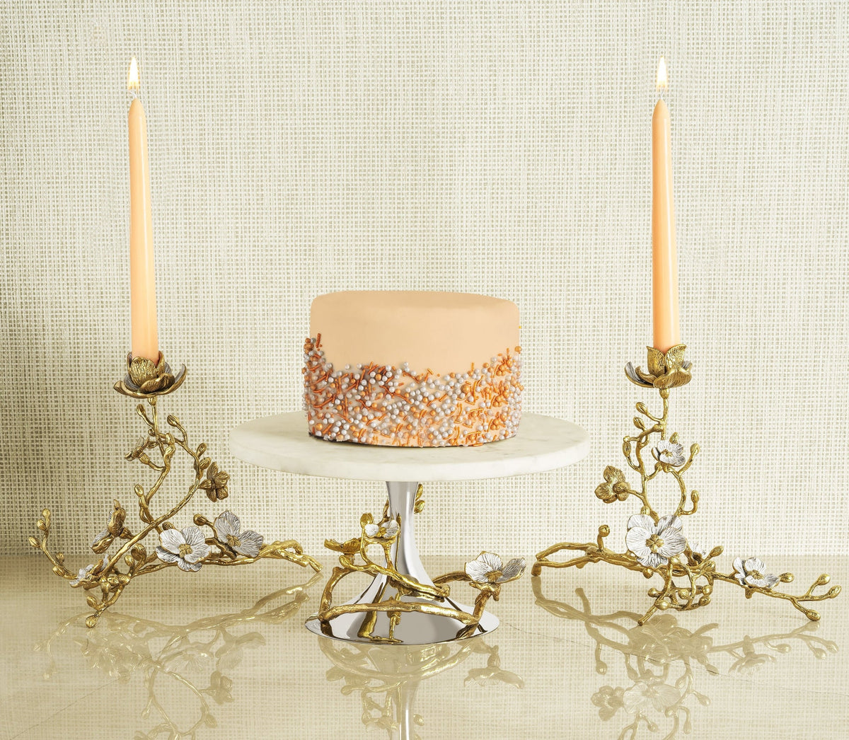 Orchid sculptural candleholder in natural brass with white enamel finish