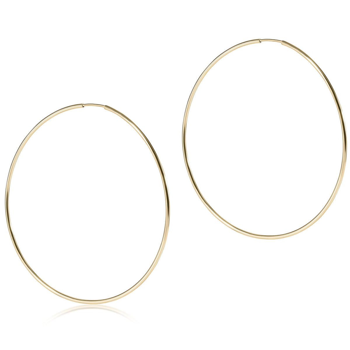 Two-inch gold-filled endless hoop earring with a seamless circular silhouette.