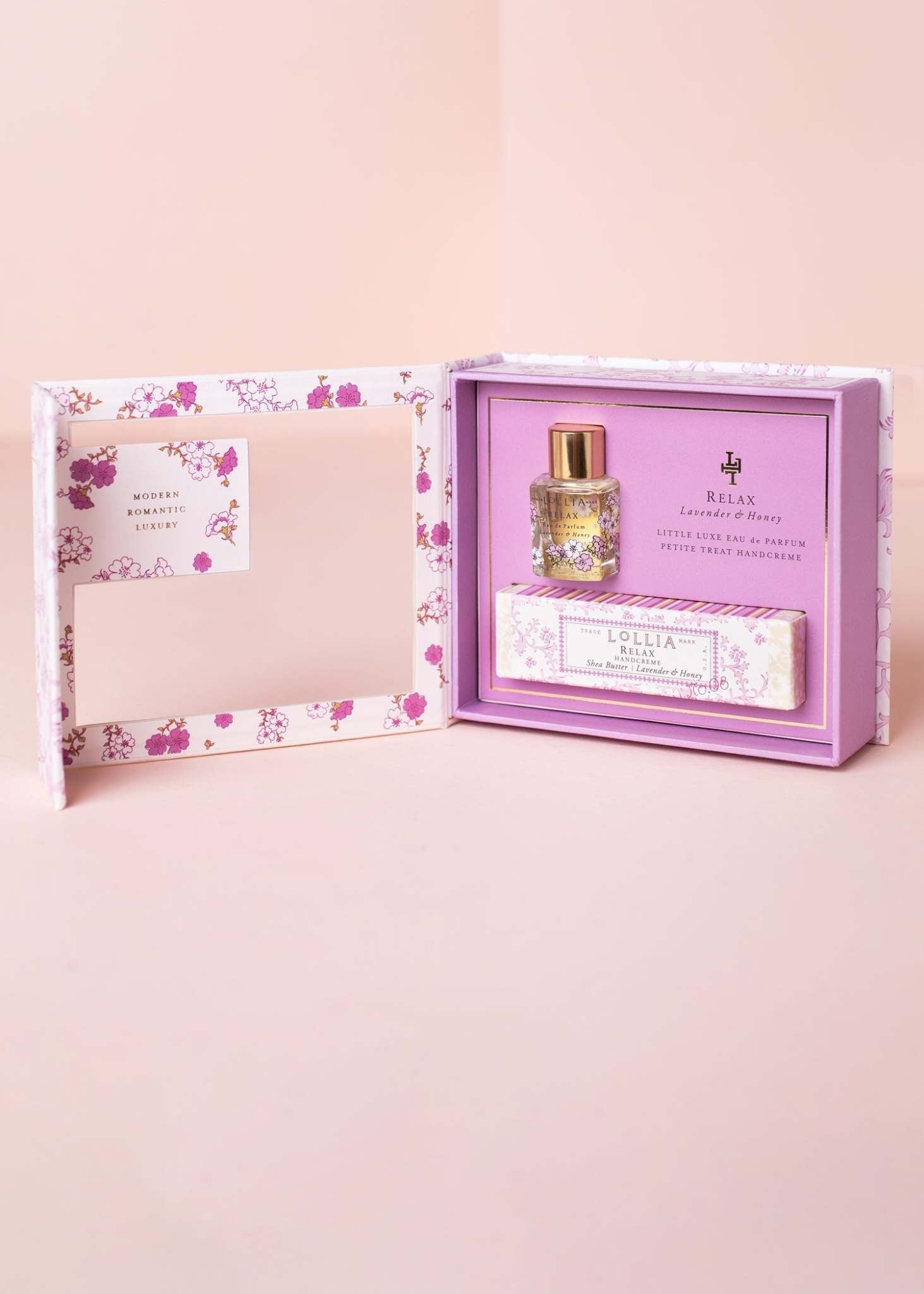 Fragrance Story gift box containing Eau de Parfum and Shea Butter Handcreme with golden accents.