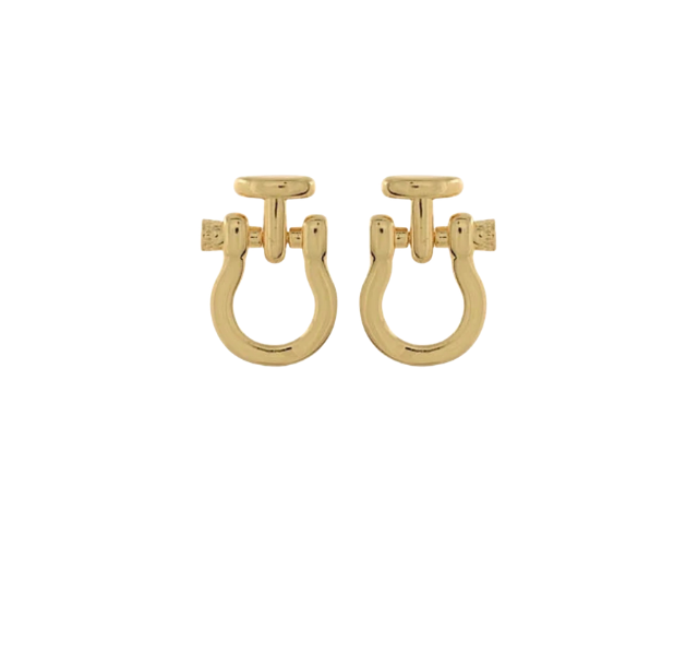 Gold horsebit-inspired stud earrings with a polished finish on a white background.