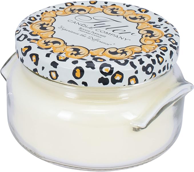 Glamfam candle in a clear glass jar with white soy-paraffin wax and citrus-rosewood fragrance.