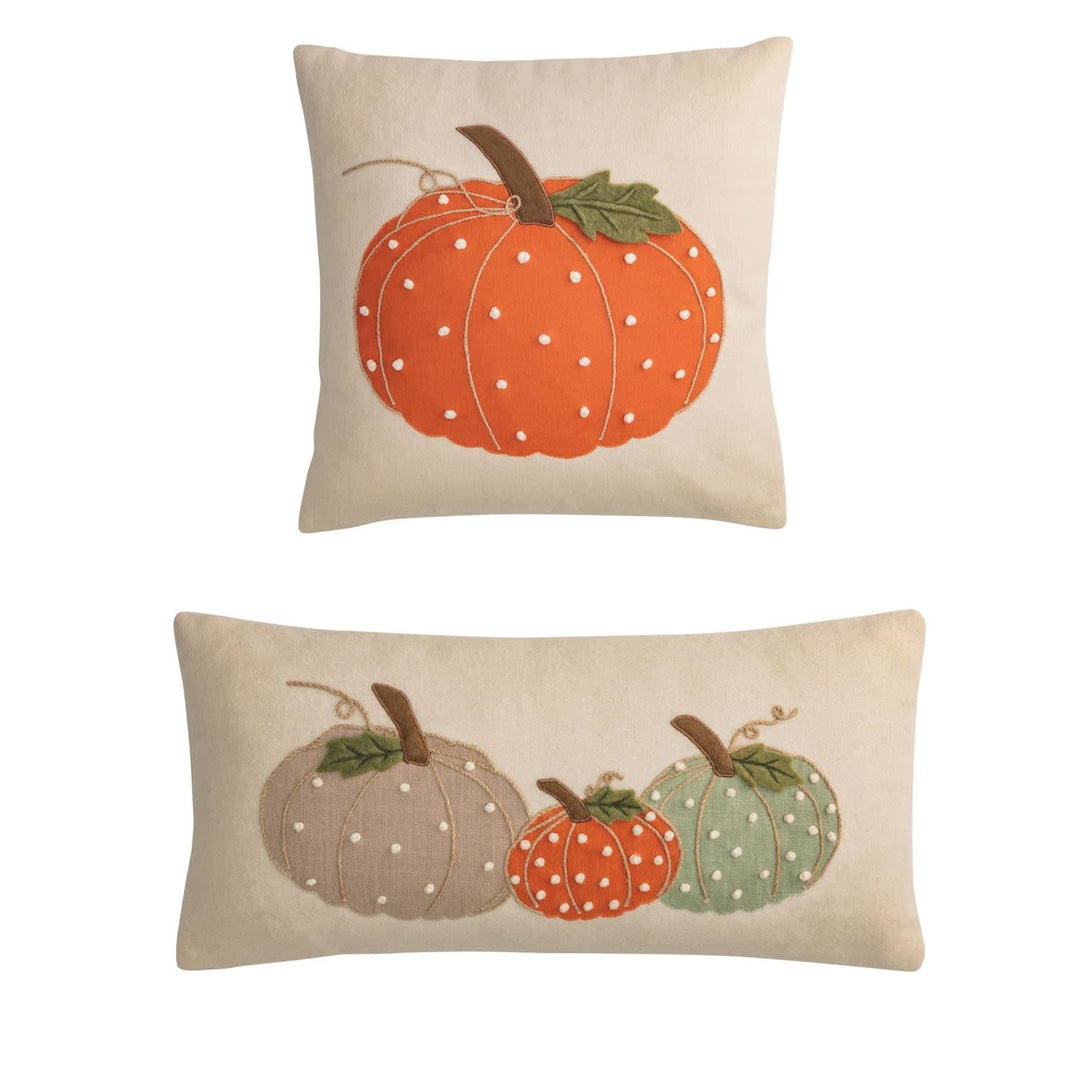 Eighteen-inch square felted wool pillow with pumpkin appliqué and French knot embroidery in autumnal tones.