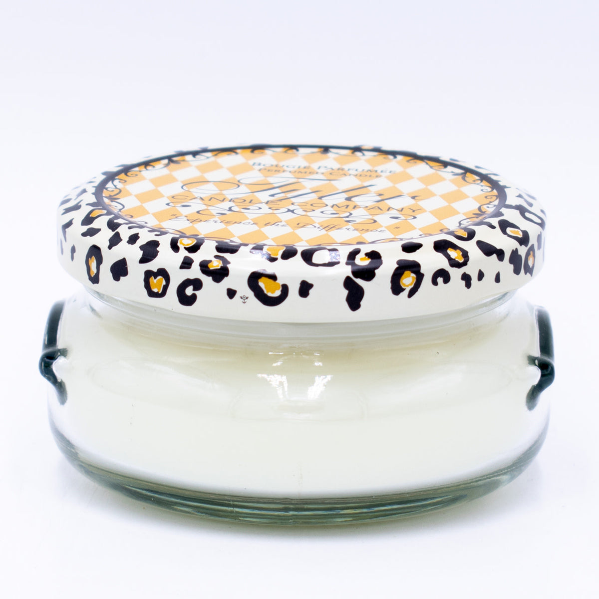 3.4oz Tyler candle in a glass jar with a leopard print and checkered lid.