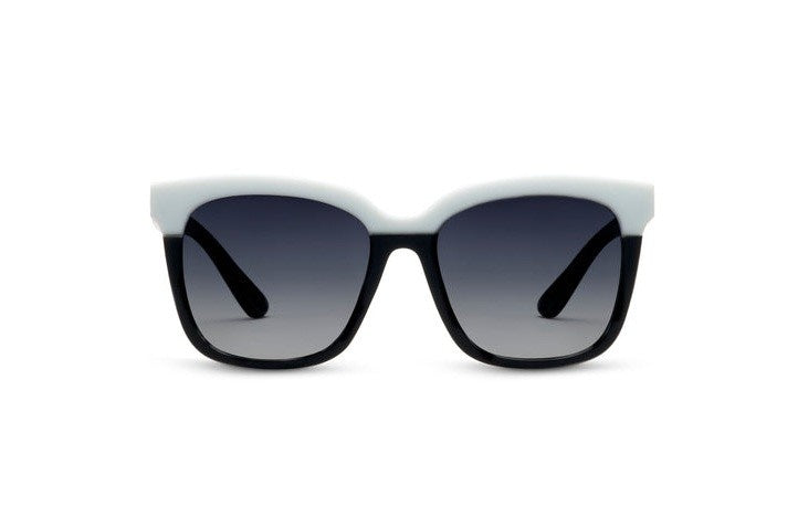 Black Frenchy Reading Sun sunglasses with white accents, square cat-eye frames, polarized lenses, and recycled polycarbonate material.