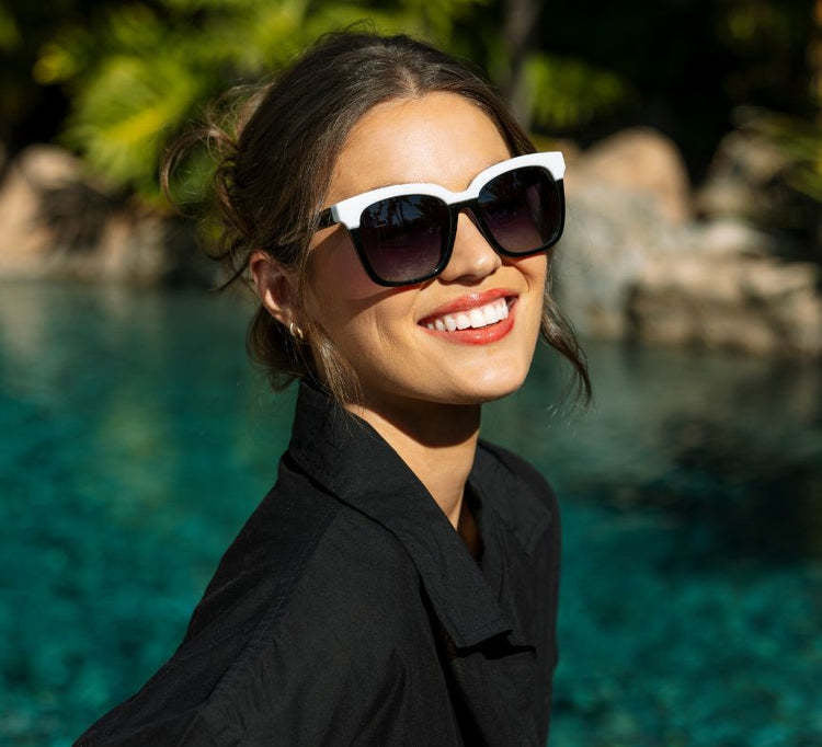 Frenchy Reading Sun sunglasses with retro-chic oversized square frames in black featuring subtle cat-eye corners and polarized lenses.