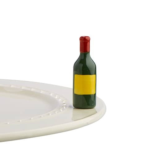 Mini ceramic wine carafe named From the Vine with a natural vine leaf pattern.