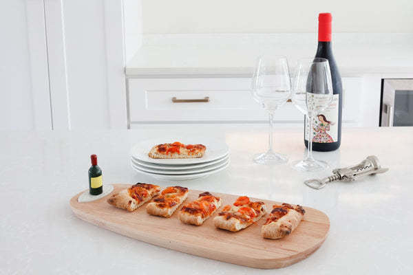 Mini ceramic wine carafe named From the Vine with a natural vine leaf pattern.