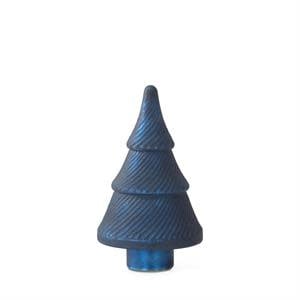 Frosted blue pressed glass Christmas tree with vintage detailing on a tabletop