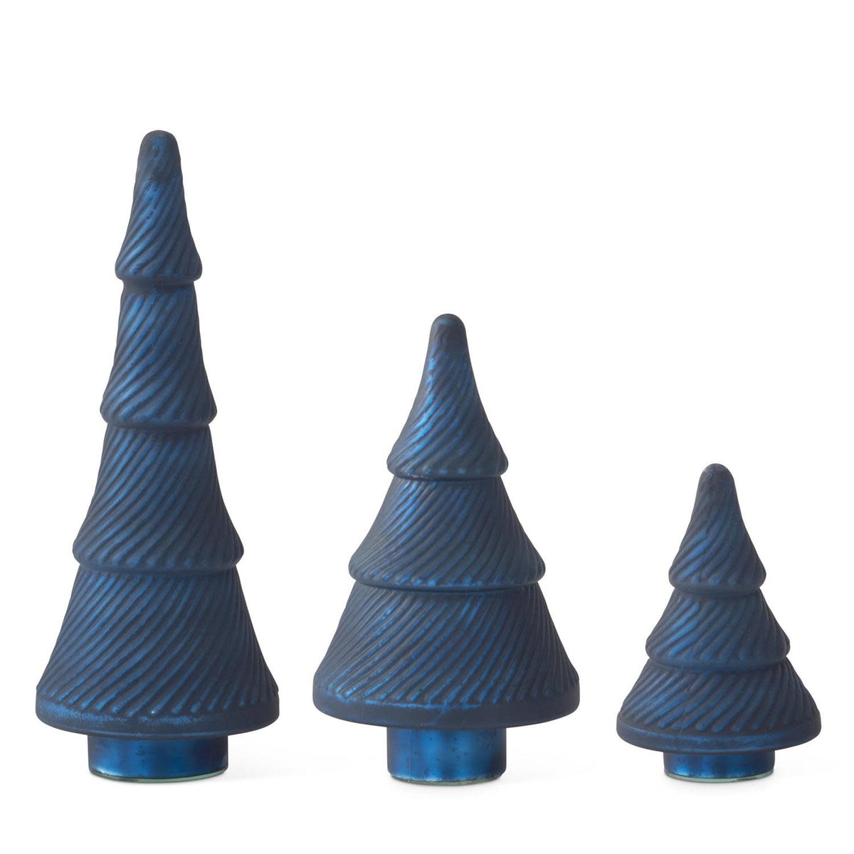 Frosted blue pressed glass Christmas tree with vintage charm on a tabletop