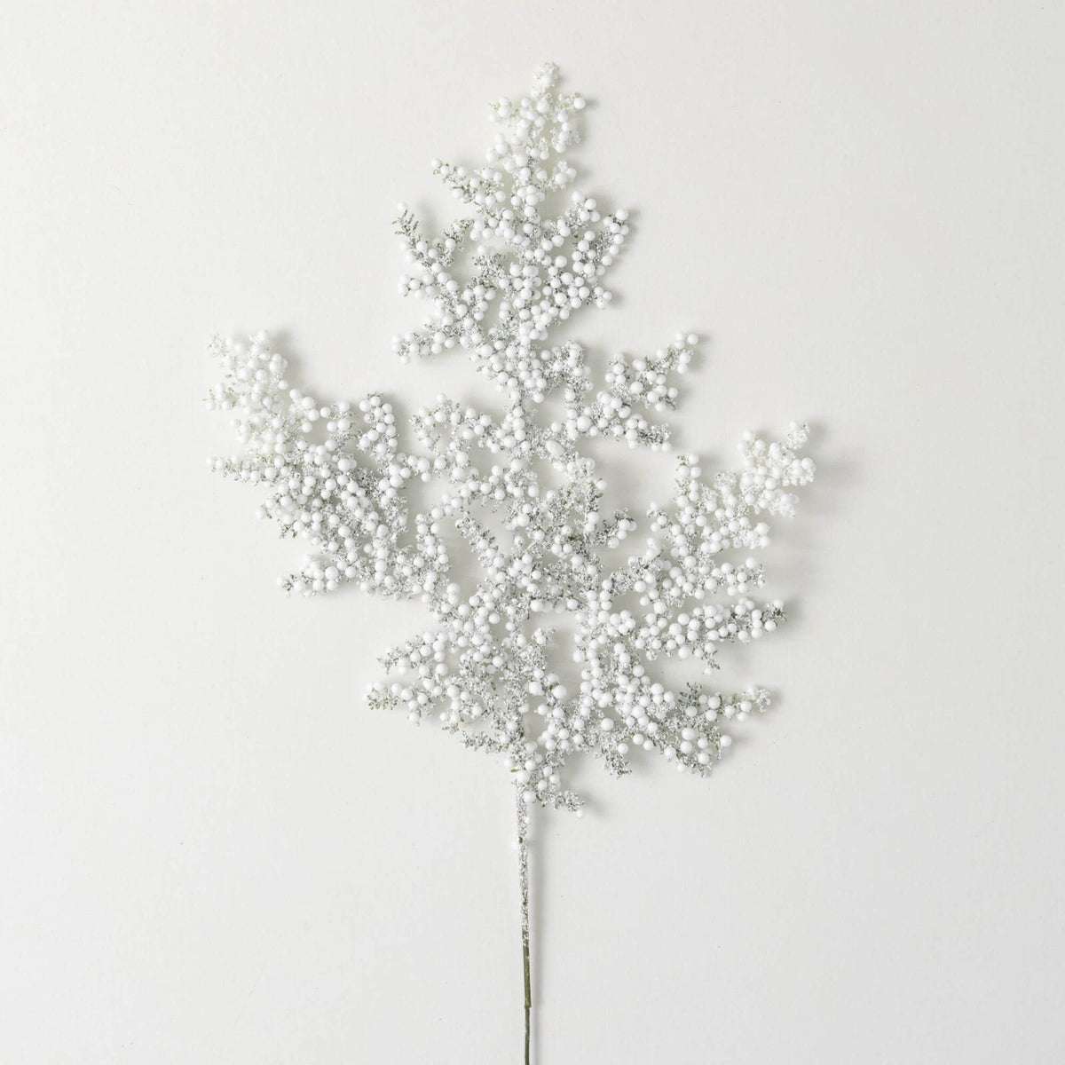 Faux frosted juniper berry spray with neutral pine twigs on a plastic stem.