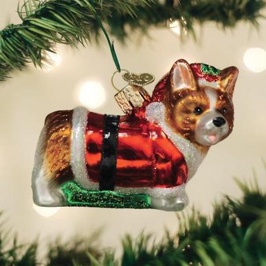 Glass Holly Hat Corgi Puppy Ornament wearing a red Santa suit and a holly-decorated hat.